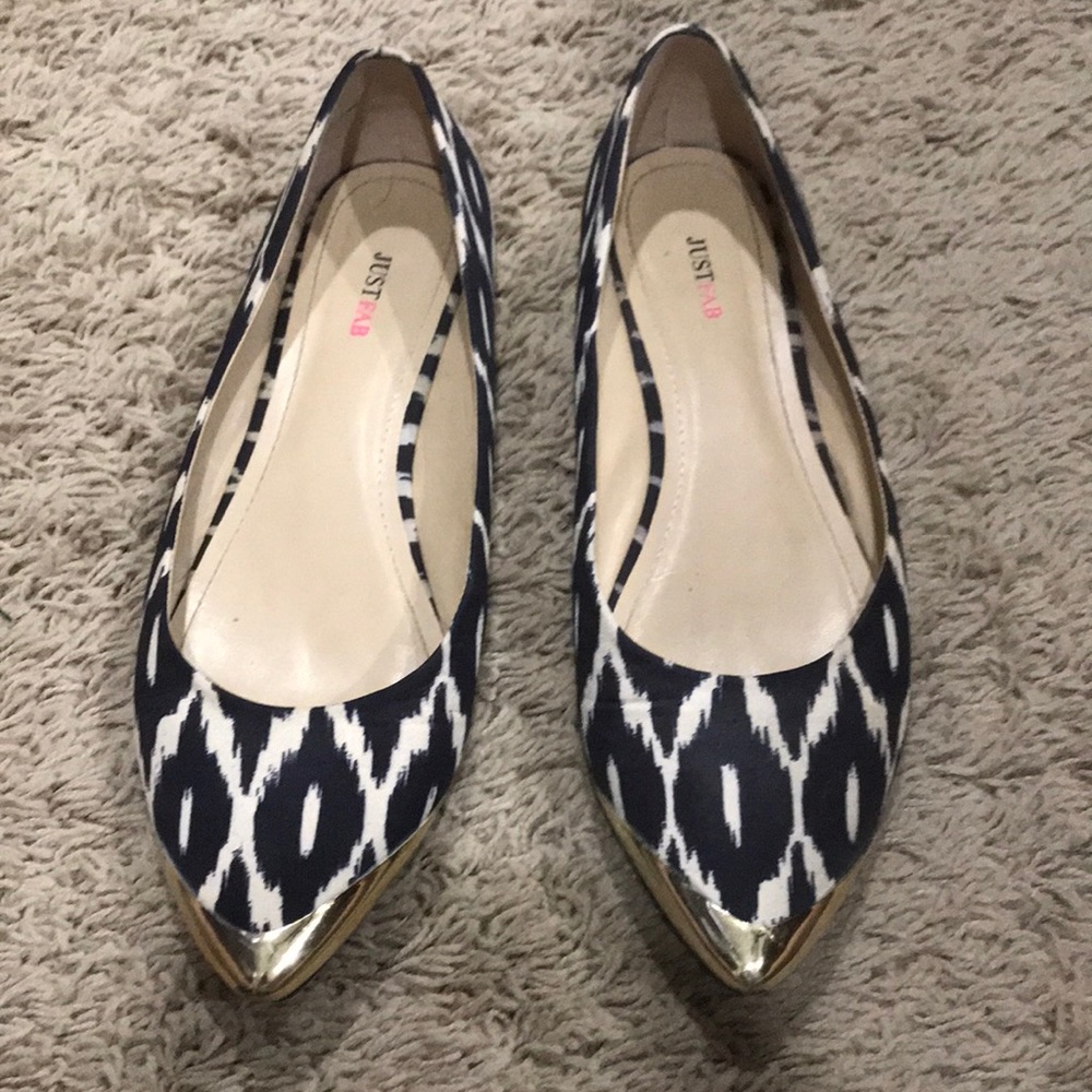 Black and white flats with gold toe